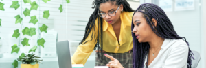 two-young-black-women-reviewing-analytical-data-on-2023-11-27-05-08-32-utc